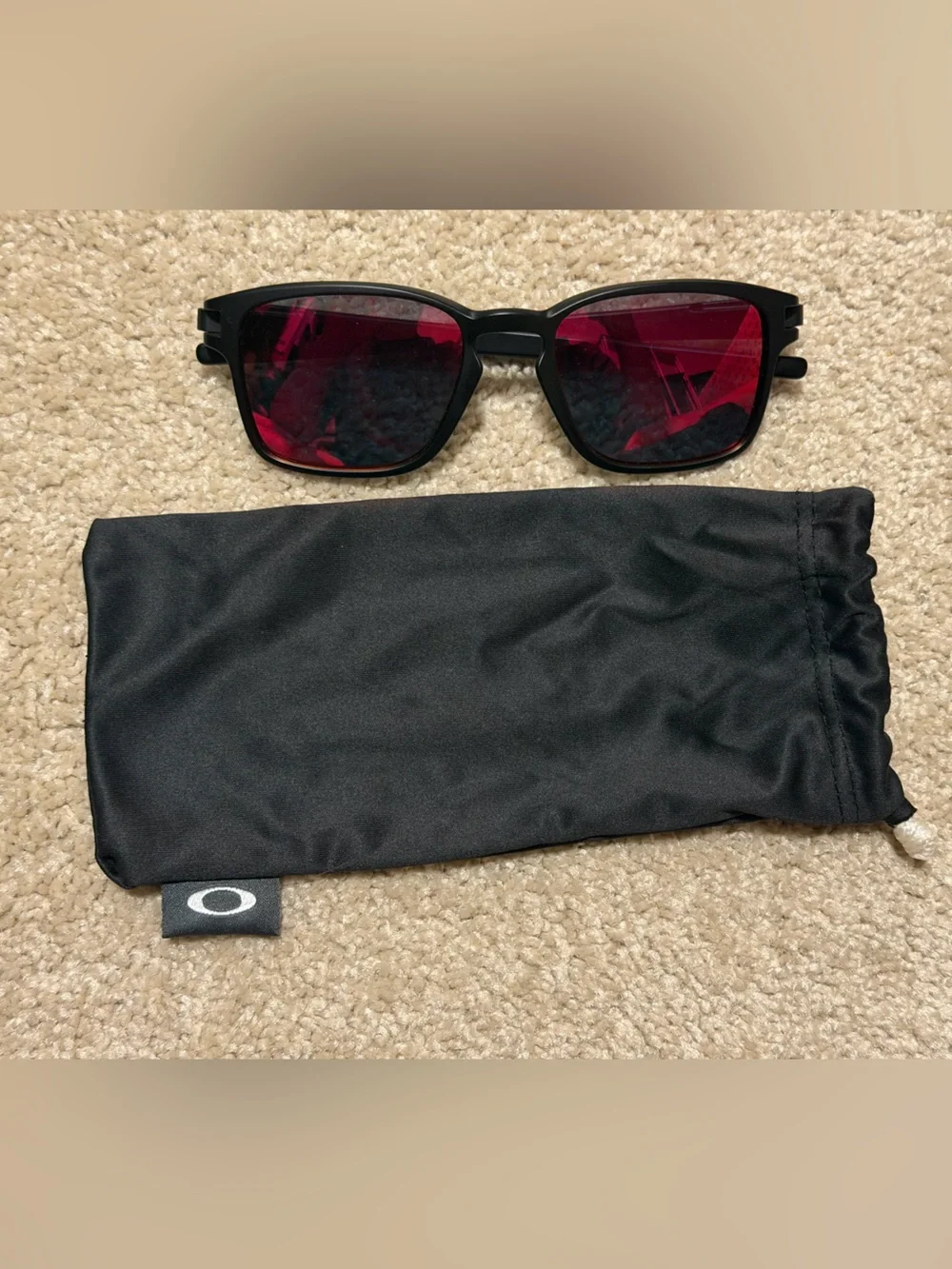 Oakley Latch Black Frame Sunglasses with Red Lenses